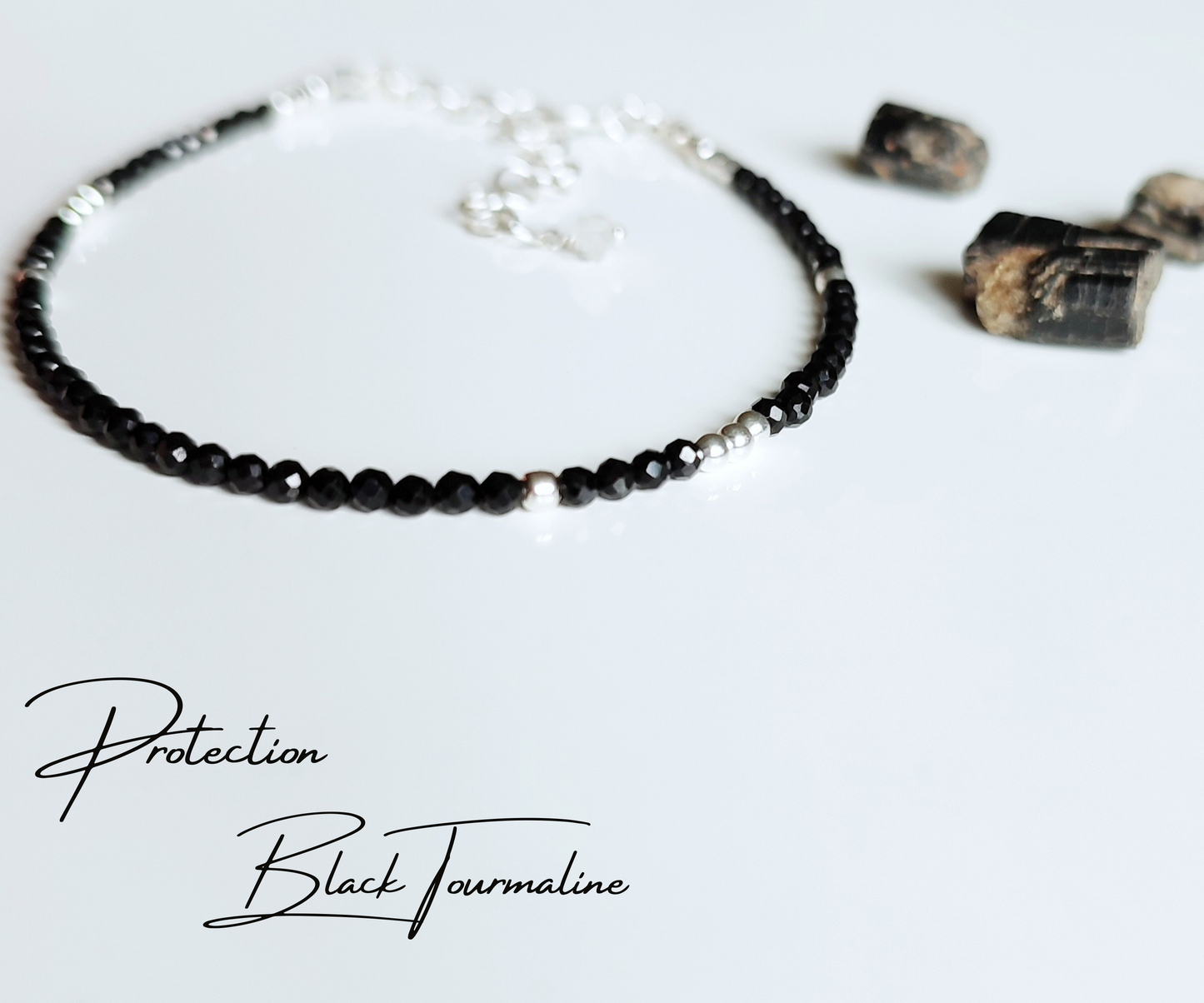 Armband mit schwarzen Turmalin Perlen und Herkimer Bergkristall